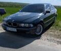 Черный БМВ 5 Серия, объемом двигателя 2.5 л и пробегом 381 тыс. км за 5200 $, фото 1 на Automoto.ua