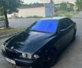 Черный БМВ 5 Серия, объемом двигателя 2.8 л и пробегом 450 тыс. км за 4000 $, фото 1 на Automoto.ua