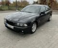 Черный БМВ 5 Серия, объемом двигателя 2.5 л и пробегом 600 тыс. км за 2300 $, фото 1 на Automoto.ua