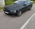 Черный БМВ 5 Серия, объемом двигателя 2.5 л и пробегом 500 тыс. км за 4500 $, фото 1 на Automoto.ua