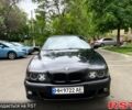 Черный БМВ 5 Серия, объемом двигателя 2.8 л и пробегом 477 тыс. км за 3950 $, фото 1 на Automoto.ua