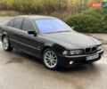Черный БМВ 5 Серия, объемом двигателя 2.79 л и пробегом 300 тыс. км за 4400 $, фото 1 на Automoto.ua