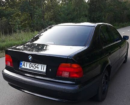 Черный БМВ 5 Серия, объемом двигателя 2.5 л и пробегом 300 тыс. км за 4800 $, фото 3 на Automoto.ua