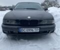 Черный БМВ 5 Серия, объемом двигателя 2.5 л и пробегом 360 тыс. км за 3599 $, фото 1 на Automoto.ua