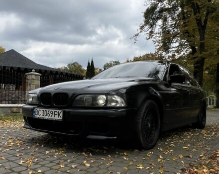 Черный БМВ 5 Серия, объемом двигателя 2.5 л и пробегом 299 тыс. км за 2999 $, фото 1 на Automoto.ua