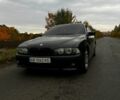 Черный БМВ 5 Серия, объемом двигателя 2.8 л и пробегом 260 тыс. км за 4950 $, фото 1 на Automoto.ua
