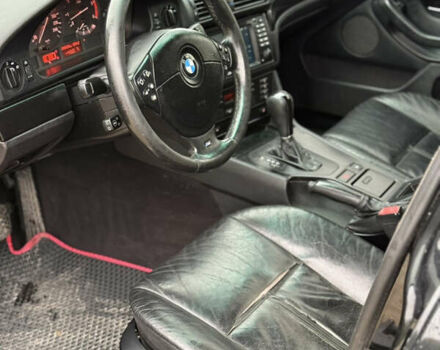 Черный БМВ 5 Серия, объемом двигателя 3 л и пробегом 400 тыс. км за 5950 $, фото 12 на Automoto.ua