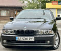 Черный БМВ 5 Серия, объемом двигателя 2.5 л и пробегом 398 тыс. км за 5000 $, фото 1 на Automoto.ua