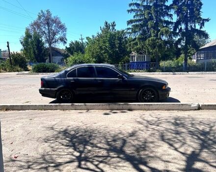 Черный БМВ 5 Серия, объемом двигателя 2.5 л и пробегом 447 тыс. км за 6000 $, фото 1 на Automoto.ua