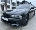 Черный БМВ 5 Серия, объемом двигателя 2.5 л и пробегом 300 тыс. км за 6700 $, фото 1 на Automoto.ua