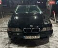 Черный БМВ 5 Серия, объемом двигателя 2.5 л и пробегом 295 тыс. км за 3999 $, фото 1 на Automoto.ua