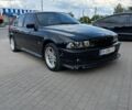 Черный БМВ 5 Серия, объемом двигателя 3 л и пробегом 200 тыс. км за 4700 $, фото 1 на Automoto.ua