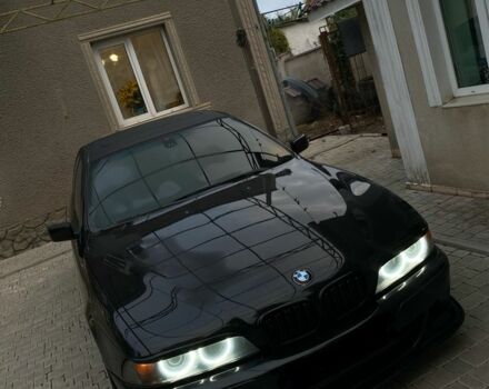 Черный БМВ 5 Серия, объемом двигателя 2.5 л и пробегом 246 тыс. км за 5500 $, фото 1 на Automoto.ua