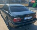 Черный БМВ 5 Серия, объемом двигателя 2.5 л и пробегом 401 тыс. км за 6700 $, фото 1 на Automoto.ua