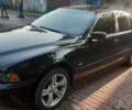 Черный БМВ 5 Серия, объемом двигателя 2.5 л и пробегом 298 тыс. км за 3560 $, фото 1 на Automoto.ua