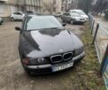 Черный БМВ 5 Серия, объемом двигателя 2.5 л и пробегом 295 тыс. км за 4200 $, фото 1 на Automoto.ua