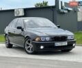 Черный БМВ 5 Серия, объемом двигателя 2.5 л и пробегом 290 тыс. км за 5700 $, фото 1 на Automoto.ua