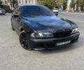 Черный БМВ 5 Серия, объемом двигателя 3.5 л и пробегом 300 тыс. км за 5000 $, фото 1 на Automoto.ua