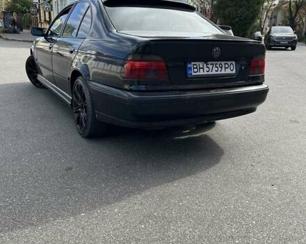 Черный БМВ 5 Серия, объемом двигателя 3.5 л и пробегом 300 тыс. км за 5199 $, фото 1 на Automoto.ua