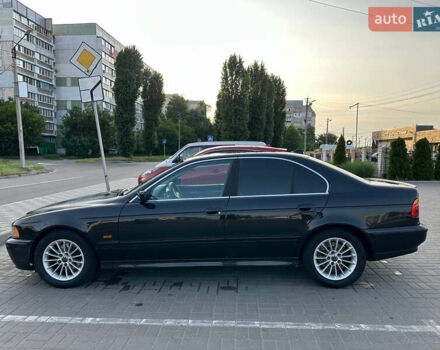 Черный БМВ 5 Серия, объемом двигателя 2.5 л и пробегом 300 тыс. км за 5700 $, фото 1 на Automoto.ua