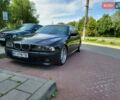 Черный БМВ 5 Серия, объемом двигателя 4.4 л и пробегом 650 тыс. км за 7000 $, фото 1 на Automoto.ua