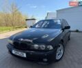 Черный БМВ 5 Серия, объемом двигателя 3.5 л и пробегом 253 тыс. км за 8500 $, фото 1 на Automoto.ua