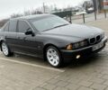 Черный БМВ 5 Серия, объемом двигателя 2.5 л и пробегом 342 тыс. км за 6200 $, фото 1 на Automoto.ua