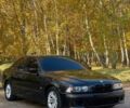 Черный БМВ 5 Серия, объемом двигателя 2.5 л и пробегом 550 тыс. км за 6300 $, фото 1 на Automoto.ua