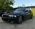 Черный БМВ 5 Серия, объемом двигателя 3 л и пробегом 455 тыс. км за 11499 $, фото 1 на Automoto.ua
