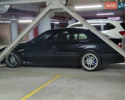 Черный БМВ 5 Серия, объемом двигателя 4.4 л и пробегом 650 тыс. км за 7000 $, фото 1 на Automoto.ua