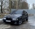 Черный БМВ 5 Серия, объемом двигателя 4.4 л и пробегом 357 тыс. км за 5999 $, фото 1 на Automoto.ua