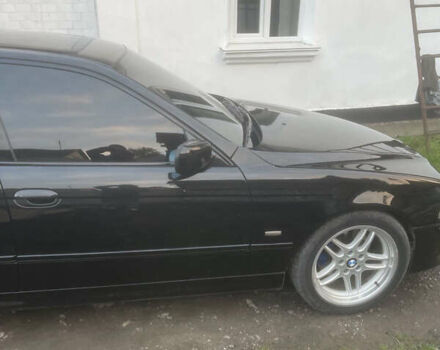 Черный БМВ 5 Серия, объемом двигателя 2.9 л и пробегом 530 тыс. км за 7500 $, фото 4 на Automoto.ua