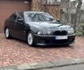 Черный БМВ 5 Серия, объемом двигателя 2.5 л и пробегом 235 тыс. км за 5400 $, фото 1 на Automoto.ua