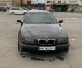 Черный БМВ 5 Серия, объемом двигателя 2.5 л и пробегом 620 тыс. км за 6000 $, фото 1 на Automoto.ua
