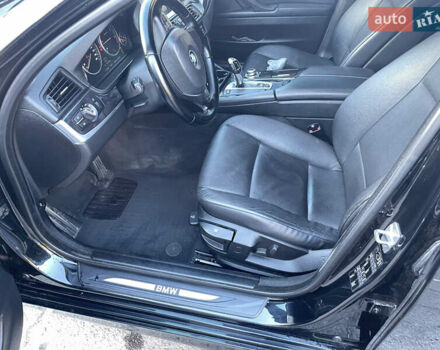 Черный БМВ 5 Серия, объемом двигателя 2 л и пробегом 313 тыс. км за 13499 $, фото 20 на Automoto.ua