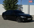 Черный БМВ 5 Серия, объемом двигателя 2 л и пробегом 322 тыс. км за 14799 $, фото 1 на Automoto.ua