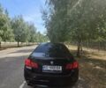 Черный БМВ 5 Серия, объемом двигателя 2 л и пробегом 208 тыс. км за 19000 $, фото 1 на Automoto.ua