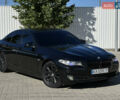Черный БМВ 5 Серия, объемом двигателя 2 л и пробегом 322 тыс. км за 14799 $, фото 1 на Automoto.ua