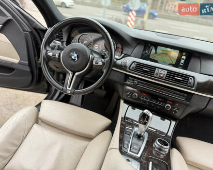 Чорний БМВ 5 Серія, об'ємом двигуна 2 л та пробігом 195 тис. км за 12999 $, фото 27 на Automoto.ua