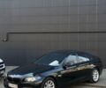 Чорний БМВ 5 Серія, об'ємом двигуна 2 л та пробігом 250 тис. км за 13100 $, фото 1 на Automoto.ua
