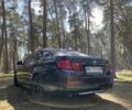 Чорний БМВ 5 Серія, об'ємом двигуна 2 л та пробігом 258 тис. км за 11000 $, фото 1 на Automoto.ua