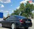 Чорний БМВ 5 Серія, об'ємом двигуна 2 л та пробігом 217 тис. км за 13999 $, фото 1 на Automoto.ua