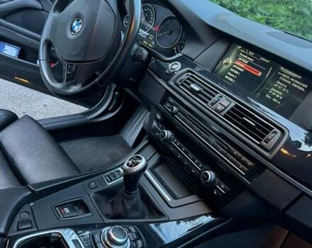 Черный БМВ 5 Серия, объемом двигателя 2 л и пробегом 230 тыс. км за 10442 $, фото 1 на Automoto.ua