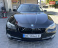 Черный БМВ 5 Серия, объемом двигателя 2 л и пробегом 210 тыс. км за 13400 $, фото 1 на Automoto.ua