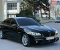 Черный БМВ 5 Серия, объемом двигателя 2 л и пробегом 243 тыс. км за 18900 $, фото 1 на Automoto.ua