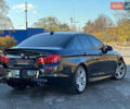 Черный БМВ 5 Серия, объемом двигателя 4.4 л и пробегом 115 тыс. км за 17900 $, фото 1 на Automoto.ua