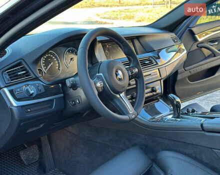 Черный БМВ 5 Серия, объемом двигателя 4.4 л и пробегом 115 тыс. км за 17900 $, фото 5 на Automoto.ua