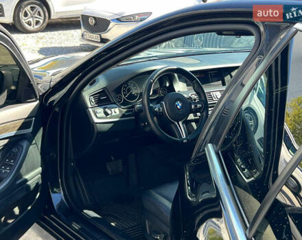 Чорний БМВ 5 Серія, об'ємом двигуна 2 л та пробігом 215 тис. км за 13500 $, фото 1 на Automoto.ua