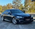 Черный БМВ 5 Серия, объемом двигателя 4.4 л и пробегом 115 тыс. км за 17999 $, фото 1 на Automoto.ua
