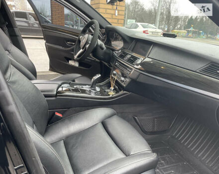 Черный БМВ 5 Серия, объемом двигателя 2 л и пробегом 98 тыс. км за 18999 $, фото 1 на Automoto.ua